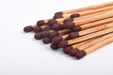 Wooden match isolated on white background, space fo text
