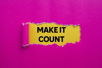 Make it count message written on ripped torn pink paper on yellow background. Conceptual make it...