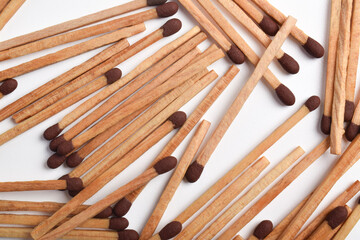 Wooden match isolated on white background. Piles of matchstick
