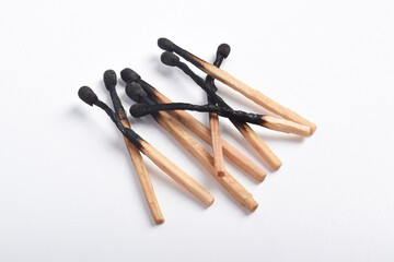 Pile of Burnt matches isolated on white background