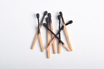 Pile of Burnt matches isolated on white background