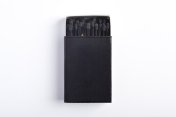 Burning matches in the matchbox isolated on white background. Box of matches.