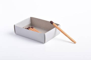Box of matches isolated on white background, for ignition, safety, and household concept.
