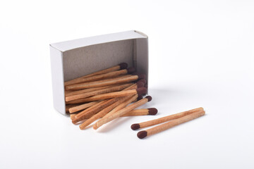 Box of matches isolated on white background, for ignition, safety, and household concept.