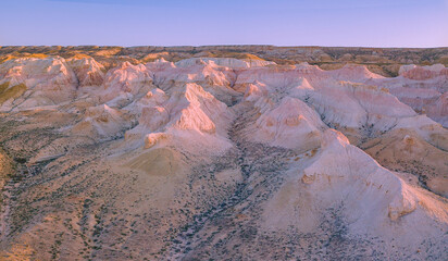 Aerial panorama image of the pink mountain top along the Tuzbair Salt March in Mangystau, west...