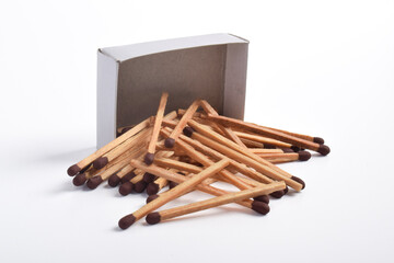 Box of matches isolated on white background, for ignition, safety, and household concept.