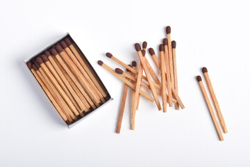Box of matches isolated on white background, for ignition, safety, and household concept.