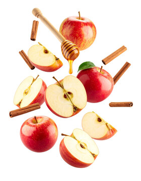 Fresh Red Apples with Honey and Cinnamon Isolated on Black Background