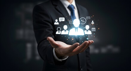 A businessman in a suit holds a glowing digital representation of a team, highlighting leadership, communication, and growth.