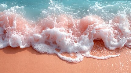 Obraz premium Pink and Blue Ocean Waves on Sandy Beach
