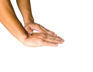 A close-up of two hands placed palm-down on a surface, set against a dark background.