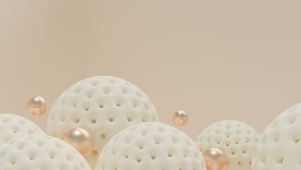 Round objects with a porous golf ball-like texture are arranged prominently in a smooth cream-colored background