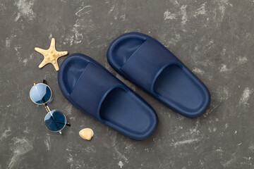 Blue sandals on concrete background,top view