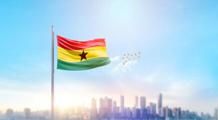 Ghana national flag waving with skyline and buildings. Ghana national flag for independence day.