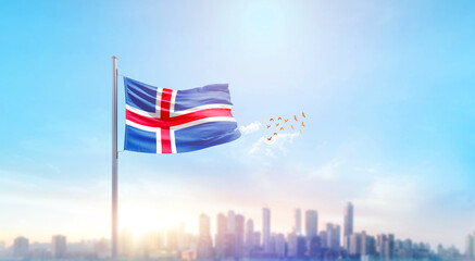 Iceland national flag waving with skyline and buildings. Iceland national flag for independence day.