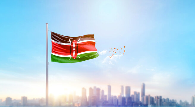 Kenya national flag waving with skyline and buildings. Kenya national flag for independence day.