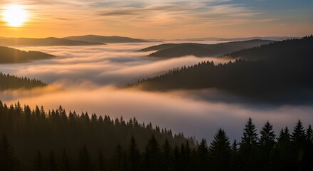 Obraz premium A scenic landscape of mountains covered in fog with a vibrant sun setting in the background sky