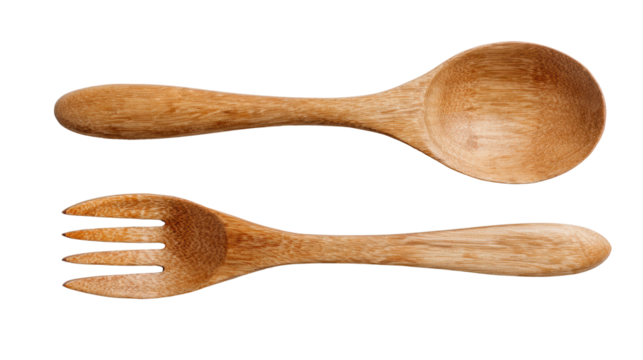 Wooden spoon and fork isolated on white background, perfect for kitchen and cooking themes.