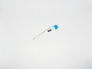 A digital thermometer isolated on a white background. Used for measuring body temperature, this medical tool represents health and wellness.