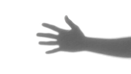 Obraz premium Transparent PNG of a Hand Reaching Out in Darkness with Glowing Trails, Mysterious Silhouette of a Hand Against a Black Background with Abstract Light Trails and Glowing Particles