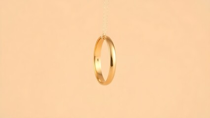Three golden wedding bands suspended vertically against a soft beige backdrop.