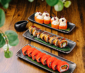 Delightful sushi platter showcasing variety of rolls and dipping sauce