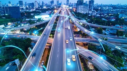 Aerial view of a futuristic highway interchange showcasing smart city infrastructure - Powered by Adobe