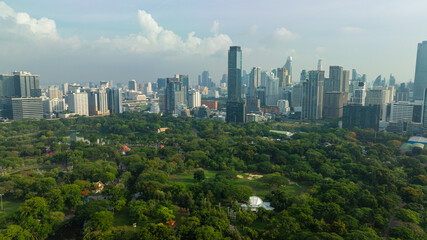 Aerial view modern office city building green tree park Lumpini public park downtown