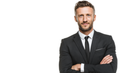Confident businessman smiling with arms crossed, wearing a formal suit, isolated on a white background.