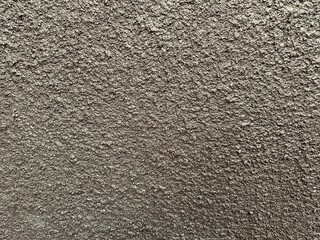 Brown rough concrete wall texture background. Rough concrete surface background. Empty space.