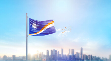 Marshall Islands national flag waving with skyline and buildings. Marshall Islands national flag...