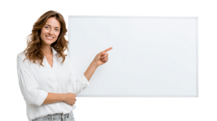 Smiling woman pointing at a blank white board, isolated on white background.