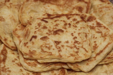 A close-up of the traditional Moroccan flatbread known as Msemmen or Msemen