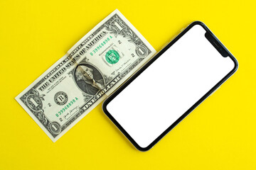 Mockup, smartphone and dollar on yellow background.