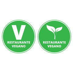Green restaurante vegano signs on a white background with copy space (trad. vegan restaurant)