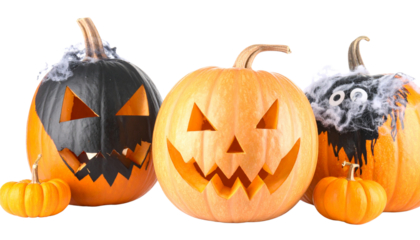 A smiling, evil pumpkin jack-o'-lantern with a carved face is a spooky symbol of the Halloween season and autumn holiday decoration