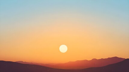 Orange Sunset over Silhouetted Mountains Light Blue Sky