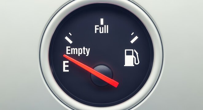 Fuel Gauge Close-up Displaying Empty, Representing Low Gas Level, and Resource Depletion with Red Indicator