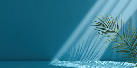 Minimalist abstract background banner with a palm leaf shadow on a blue wall, light rays, and empty space for product presentation.