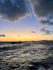 sunset over city, view from the sea, boat, coast, dusk	