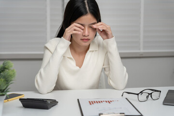Eye problems, Asian women with tired and irritated eyes, eye rubbing, dry, eye pain after work,...