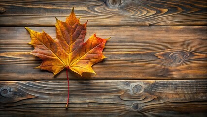 Obraz premium Autumn Leaf Fragment on Wooden Plank