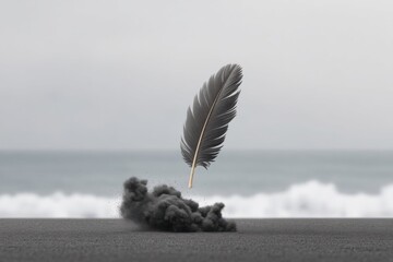 A black feather hovering above a cloud of dark dust against a blurred ocean background.