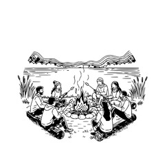 Group of people roasting marshmallows around a campfire near a lake with mountains in the background