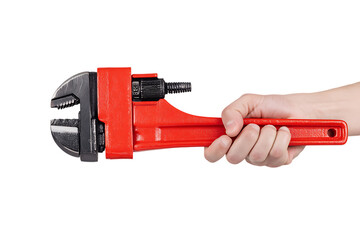 Close up of a hand gripping a red pipe wrench.