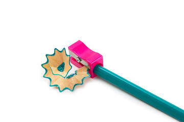 Pencil sharpener isolated on white background. Pencil and pencil shavings. Stationery. School...