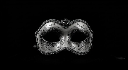 Ornate silver masquerade mask with jewel detail isolated on a plain solid color surface shown centered - ia generated