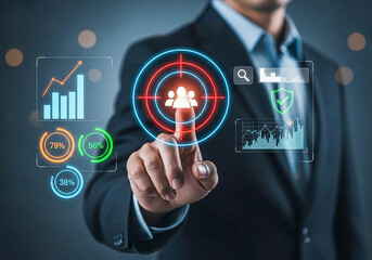 Businessman points to target audience on futuristic digital interface with data analytics