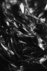 Abstract close-up of dark, jagged, crystalline shapes