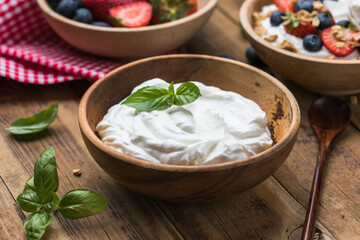 Greek Yogurt in wooden bowl
